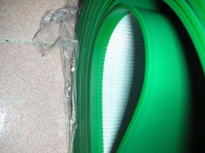 Why do PVC conveyor belts need edge wrapping?